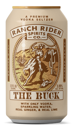 An image of the Ranch Rider The Buck pre-made cocktail can. The can is light khaki with brown, yellow, and cream details. The label says "A premium vodka seltzer" at the top. Below that, there is an image of a cowboy on a horse with a rope on a desert backdrop. Below the logo, the label says: "The Buck, with only vodka, sparkling water, real ginger and real lime."