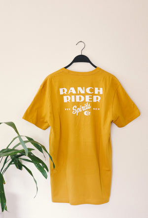 Yellow t-shirt with the words “Ranch Rider Spirits Co.” in white on the back.